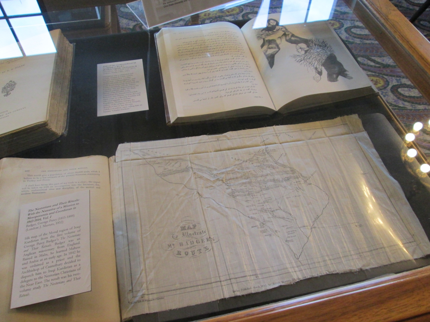 Display with silk map of the Mosul region, London, 1852